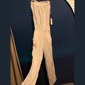 LAST CHANCE donating Monday gorgeous cover up romper new with tags. Size M